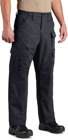 PRICES MAY VARY. READY FOR DUTY: Designed with the job in mind, our Uniform Tactical Pant has all the premium, multifunctional features at an affordable price, so can you report to duty with a classic and professional look CARRY IT ALL: Extra large belt loops are designed for a nylon duty belt. There are 2 back pockets with hook and loop closure, 2 front pockets with reinforced opening for folding knife or tool clip, and 2 double cargo pockets with open-top slash pockets COMFORT + PERFORMANCE: M Men's Uniform, Duty Belt, Large Belt, Safety Clothing, Tactical Pants, Work Safety, Knee Pads, Folding Knife, Folding Knives