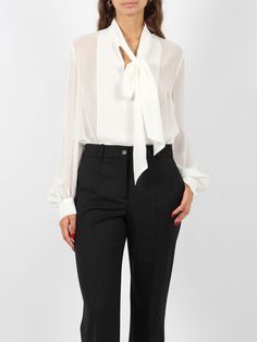 P. A. R. O. S. H Polodori blouse, with semi-transparent crepe effect. - FW24 - V-neck with bow - Pleated details - Long sleeves with gathered hem - Cuff with button - Made in Italy - 100% Polyester Elegant V-neck Top With Bow, Elegant V-neck Blouse With Sheer Sleeves, Silk Blouse With Sheer Sleeves For Work, Elegant V-neck Top With Sheer Sleeves, Classic Office Tops With Sheer Sleeves, Classic Sheer Sleeve Tops For Office, Silk Workwear Blouse With Bow, Feminine Blouse With Sheer Sleeves For Work, Chic Sheer Sleeve Blouse For Work