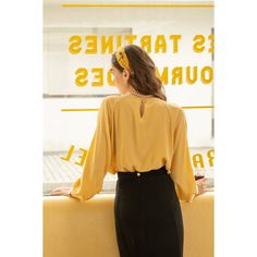 A silk blouse with a color that resembles soft sunlight, like twinkling starlight. The neckline has pleat details, giving it a sophisticated and classy look. An elegant atmosphere with a smooth drape. 
 
 
 Size 
 
 S size
 
 Length: 62cm 
 Bust: 98cm 
 Sleeve length: 69cm 
 
 
 M size 
 
 Length: 63cm 
 Bust: 102cm 
 Sleeve length: 70.5cm 
 
 L size 
 
 Length: 64cm 
 Bust: 106cm 
 Sleeve length: 72cm 
 
 XL size 
 
 Length: 65cm 
 Bust: 110cm 
 Sleeve length: 73.5cm 
 
 
 
 Material 
 
 Silk Gold V-neck Blouse For Work, Office Blouse With Blouson Sleeves, Elegant Gold Silk Blouse, Elegant Padded Blouse, Elegant Padded Blouse Tops, Silk Blouse With Pleated Sleeves For Party, Silk Party Blouse With Pleated Sleeves, Elegant Gold Blouse For Workwear, Gold V-neck Chic Blouse