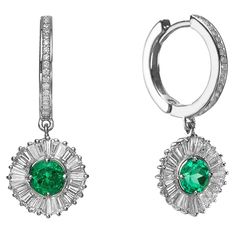 One of a Kind Ballerina Style Emerald and diamonds Earrings starring 2 natural emeralds 1.2 Carats and surrounded by 48 Baguette cut diamonds and 34 round diamonds. Jewel Details: Center- 2 Natural Emeralds, Round Brilliant cut 1.2 Carat Total Weight Surrounds- 48 Diamonds, Baguette Cut, 1.68 Carat Total Weight E-G VS 18 K white gold Earring Posts- 34 Diamonds, round brilliant cut 0.17 Carat total weight, E VS 14K white gold Diameter of posts is 16 mm Earrings come in a classic jewelry Box Match Emerald Diamond Earrings, Diamonds Earrings, Ballerina Style, Platinum Earrings, Baguette Cut Diamond, White Gold Earrings, Diamond Drops, Diamond Drop Earrings, Classic Jewelry