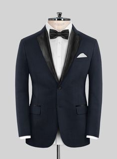 Set your style ablaze with the irresistible allure of the Napoleon Dark Blue Wool Tuxedo Suit. Meticulously crafted from the finest premium wool, this tuxedo features a deep, rich blue hue that adds a subtle yet striking visual appeal to your ensemble. Whether you're attending a black-tie gala, a luxury wedding, or a formal evening soirée, the Napoleon Dark Blue Wool Tuxedo Suit is your ticket to commanding attention and making an unforgettable impression.  Featuring satin lapel, matching satin Elegant Single Button Blue Tuxedo, Luxury Tuxedo With Structured Boning And Suit Collar, Tailored Single Breasted Tuxedo For Party, Single Breasted Tuxedo For Wedding, Single-breasted Tuxedo For Wedding, Custom Fit Single Breasted Tuxedo For Wedding, Wedding Tuxedo Single Breasted, Luxury Single Button Formal Blazer, Elegant Fitted Blue Tuxedo