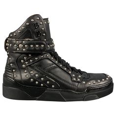 GIVENCHY high top sneakers comes in a black leather featuring a silver studded details, rubber sole, and a lace up style. Very Good Pre-Owned Condition. Light wear. As-is. Marked: 42 Measurements: Length: 11.5 inches Width: 4.25 inches Height: 8 inches Reference: 124998 Category: Sneakers More Details Brand: GIVENCHY Size: 9 Gender: Male Color: Black Pattern: Studded Fabric: Leather Style: High Top Condition: AS IS Age Group: Adult Luxury High-top Sneakers With Perforations For Streetwear, Edgy Lace-up Sneakers With Studded Rubber Outsoles, Edgy Studded Lace-up Sneakers, Designer High-top Sneakers With Perforations For Streetwear, Punk Style Leather High-top Sneakers, Leather High-top Sneakers With Perforations And Round Toe, Leather High-top Sneakers With Perforations, Leather Sneakers With Studded Rubber Outsoles For Streetwear, High-top Leather Sneakers With Spikes