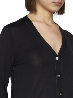 30% Silk, 58% Wool, 23% Silk, 70% Wool, 2% Elastane, 17% Polyamide Luxury Fitted V-neck Cardigan, Chic V-neck Cardigan For Formal Occasions, Elegant V-neck Sweater For Daywear, Luxury V-neck Outerwear With Button Closure, Elegant V-neck Sweater For Business Casual, Elegant V-neck Fine Knit Cardigan, Designer V-neck Cardigan With Button Closure, Elegant Merino Wool Tops For Work, Elegant Fine Knit Cardigan For Workwear