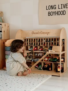 "If your kid loves cars, a large toy car storage from ChildUniverse will take a worthy place in your home toy collection. Handcrafted to last for generations, the wooden toy car parking garage has a compact size, so it's perfect for 1-4-year-olds. Excellent gift for boys who like vroom-vroom toys will make every other Birthday, Christmas, or Thanksgiving more festive The toy car storage garage has several floors. Purchase a garage to get: * Handcrafted piece of design that fits any interior of a playroom, nursery, bedroom, or living room; * A personalized toy to make it an exclusive gift to make the Christmas season more festive; * A fantastic game for group play (let kids socialize!); * A safe tool to boost kid's motor skills and help them cultivate their imagination; * An easy-to-assembl My Garage Toy Cars, Cars Storage For Kids, Montessori Boys Room, Toy Vehicle Storage, Toy Car Organization, Gifts For One Year Old Boy, Gifts For 3 Year Boy, Magnatile Storage, Toy Garage Diy