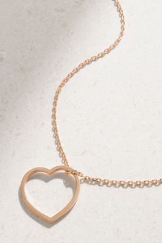 Repossi's necklace is part of the label's 'Antifer' collection named after Normandy's breath-taking cliffs. It's cast from 18-karat rose gold and strung with a sweet heart pendant, which can be removed and styled as a ring too. Luxury Rose Gold Double Heart Jewelry, Luxury Heart-shaped Necklace With Delicate Chain, Luxury Heart Pendant Necklace For Formal Occasions, Luxury Open Heart Necklace - Gift, Luxury Heart-shaped Rose Gold Necklace, Luxury Open Heart Necklace For Gift, Luxury Open Heart Necklace Gift, Luxury Rose Gold Heart-shaped Jewelry, Luxury Heart Pendant Necklace With Delicate Chain