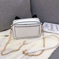 #SS0520 Material: PU Color: black, white Size: 19cm*12cm*7cm Shoulder strap length: 120cm Shipping: Free Shipping Worldwide for order over 15$, 7-15 days delivery to US/UK/CA/AU/FR/DE/IT and most Asia Countries Trendy White Shoulder Bag, White Casual Bags As Fashion Accessory, Trendy White Rectangular Phone Bag, Trendy White Phone Bag With Adjustable Strap, White Cat Design Shoulder Bag, Trendy White Bag With Cat Design, White Shoulder Bag With Cat Design, White Rectangular Shoulder Bag With Cat Design, Trendy White Phone Bag With Zipper