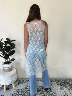 Channel your inner free spirit with Wanderlust, the perfect travel companion. This floral lace tunic is a versatile piece that can be worn as a bathing suit cover up or layered with a tank, tube top, bike shorts, or jeans. With a scallop edge detail and a beige hue, it's both feminine and functional. 60% Nylon 40% Cotton. Besties: LBD, Tubin, Biking Day Trip, Cupid's Dart Wicked, Reverse It, Biking, True Love, Overcast Summer Beachwear Cover-up With Lace Trim, Crochet Lace Cover-up For Beach Season, Chic Lace Cover-up For Beach Season, Sleeveless Summer Cover-up With Crochet Trim, Crochet Lace Cover-up For Vacation, Spring Festival Lace Cover-up, Stretch Cover-up For Summer Festivals, Bohemian Fitted Sheer Cover-up, Sheer Lace Beachwear Cover-up