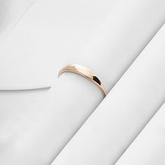 The Tiny Signet Ring is the pinnacle of minimalist design and elegant rings. Its plainness with glamorous modesty will fascinate people around you. It is perfect for everyday use and ring stacking. - Made in 14k Solid Gold - Band Width: 1.26 mm / 0.04 inches- Top Width: 3.30 mm / 0.12 inches- Thickness: 1.06 mm / 0.04 inches - This product comes with iconic Norm Jewels gift box Minimalist Dome Ring With Thick Band For Wedding, Formal Stackable Midi Rings With Round Band, Elegant Thick Band Stackable Rings For Formal Occasions, Formal Stackable Rings With Smooth Bezel, Minimalist 14k Gold Dome Ring For Wedding, Elegant Couple Rings With Thick Band, Modern Rose Gold Stackable Rings For Formal Occasions, Minimalist Thick Band Wedding Rings, Sleek Round Band Jewelry For Everyday