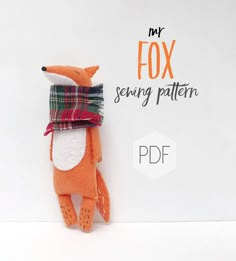 an orange stuffed animal with a plaid scarf on it's head and the words, my fox sewing pattern