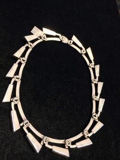 "Beautiful old Taxco, Mexico, sterling silver & faceted onyx necklace... great unusual link design! Very Mid Century Modern. 15 links stamped 925 & MEXICO also stamped \"TS-45\" 15.5\" long 1 3/16\" x 3/4\" links 91R - This stunning piece is coming from an exciting new relationship with a well known & popular Santa Fe, NM, jewelry gallery. I will be listing many exquisite, even World Class, pieces, many at lower prices than they are offered at in the gallery! The owner is a certified Modern Metal Necklaces For Formal Occasions, Modernist Geometric Jewelry For Formal Occasions, Modern Jewelry With Sterling Silver Clasp, Modern Silver Necklace For Formal Occasions, Modernist Polished Silver Necklaces, Formal Sterling Silver Geometric Jewelry, Formal Geometric Sterling Silver Jewelry, Sterling Silver Geometric Jewelry For Formal Occasions, Modern Silver Jewelry With Unique Design