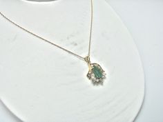 "For Sale: (1) H280 Stunning 14k Yellow Gold Emerald Necklace with Multiple Diamonds PLEASE READ ENTIRE DESCRIPTION BEFORE PURCHASING Pre-owned item. This is beautiful 14k yellow gold necklace featuring pear shaped Emerald in the center with multiple diamonds of different shape around it. No visible flaws, just some scratches please see pictures for details. Sold as is, as seen on pictures. There are earrings available that go with this necklace, and those earrings sold separately. Specifics: * Fine Jewelry Custom Pendant Necklace For Wedding, Formal 14k Gold Pendant Necklace, Formal Heirloom Necklace Stamped 14k, Gold Emerald Pendant Necklace With Prong Setting, Fine Jewelry 14k Gold Necklace With Prong Setting, Fine Jewelry Diamond Pendant Necklace With 17 Jewels, Classic Emerald Pendant Necklace For Wedding, 14k Gold Oval Diamond Necklace With Gemstone, Heirloom Diamond Pendant Necklace