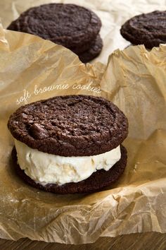 chocolate cookies and ice cream sandwich on wax paper