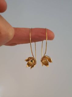 Drop gold blooming flower earrings. Designer delicate dangle earring. wedding jewelry. Romantic gift for her. everyday minimalist. This is a gold plated earrings. It is a blooming flower dangle earrings, a small delicate minimalist earrings that can be worn every day. It is a beautiful piece perfect for giving to a special someone or as a gift or to yourself. Its a great gift for sister, graduation, bridesmaid gifts, girlfriend, good friends, mother gift for all seasons. All my gold plated earri Delicate Birth Flower Earrings For Anniversary, Brass Flower Earrings For Wedding, Flower Shaped Brass Wedding Earrings, Gold Flower Pendant Earrings For Wedding, Gold Flower-shaped Earrings For Wedding, Flower-shaped Brass Wedding Earrings, Delicate Drop Flower Earrings For Bridesmaid Gift, Delicate Birth Flower Earrings, Delicate Rose Gold Birth Flower Earrings