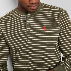 This US Polo Assn. men's striped long-sleeve henley shirt is a timeless everyday style to add to your collection. Made from a thermal cotton blend in a classic-fit, this top has a button closure and the brand's logo embroidered at the front. Team it with your favorite jeans or chinos.Features: EmbroideredClosure Type: Pullover Head, ButtonFit: Classic FitNeckline: Crew NeckSleeve Length: Long SleeveFiber Content: 60% Cotton, 40% PolyesterFabric Description: ThermalCare: Machine Wash, Tumble Dry… Long Sleeve Cotton Shirt With Horizontal Stripes, Green Long Sleeve Tops With Striped Collar, Yarn-dyed Long Sleeve Cotton Tops, Long Sleeve Yarn-dyed Cotton Tops, Casual Long Sleeve Yarn-dyed Top, Casual Henley T-shirt With Buttons, Men’s Henley, Men’s Long Sleeve Polo, Cotton Henley T-shirt With Buttons