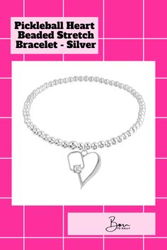 Love pickleball and want to wear your passion? This gorgeous Pickleball Heart Beaded Stretch Bracelet - Silver is the perfect way to do it! An adorable accessory that every pickleball fanatic will adore. Priced at $34.99, it's an affordable addition to your jewelry collection and an ideal gift for the pickleball lover in your life!#Borntorally #jewelry #Pickleballbracelet #Pickleball #bracelet #braceletforgirls Casual Silver Bracelet For Valentine's Day, Casual Silver Jewelry For Valentine's Day, Heart Shaped Adjustable Tennis Bracelet Gift, Heart Shaped Adjustable Tennis Bracelet As Gift, Adjustable Heart-shaped Tennis Bracelet As Gift, Heart-shaped Adjustable Tennis Bracelet As Gift, Casual Silver Jewelry With Heart Beads, Trendy Silver Tennis Bracelet For Gift, Trendy Silver Tennis Bracelet As Gift