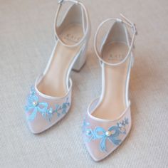 Meet our one of the newest styles, Halo! So many of you have been asking for pretty closed toe wedding shoes with low block heels... We designed Halo with our modern brides in mind! Pretty bow and pearl details with soft insole padding and perfect fit, Halo is the perfect shoes for all day comfort! Did we mention Halo has "I Do" and "Forever" embroidered on the back!!! The perfect details for your wedding! Bridal Shoes Low Block Mid Heels with "I Do" and "Forever" in baby blue embroidery Style “ Luxury Spring Wedding Shoes With Block Heel, Wedding Shoes Low Heel Lulus, Lace Shoes In Short Wedding, Comfy Wedding Shoes Low Heel, Luxury Spring Wedding Court Shoes, Low Heel Bridal Shoes Veaul, Dream Wedding Shoes Bhldn Weddings, Wedding Shoes Bride Kailee P., Comfortable Bride Shoes