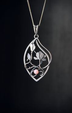 ITEM DESCRIPTION: The size H 5 cm x W 3 cm (1 3/4 x 1 inch). Weight - 4g. You can buy it with the chain or without. I made this blossom magnolia necklace of sterling silver and natural pink opal. It looks so elegant and sincerely! The gemstone has a light pink color - - the same as magnolia petals. The floral necklace is lightweight and comfortable This botanical pendant will be a great addition to your jewelry collection or a great gift for someone you love. Ooak jewelry made by eco-friendly ma Nature-inspired Jewelry With Flower Charm, Elegant Flower-shaped Large Pendant Jewelry, Elegant Flower Shaped Large Pendant Jewelry, Elegant Floral Large Pendant Jewelry, Elegant Flower-shaped Jewelry With Charms, Unique Flower-shaped Metal Jewelry, Unique Flower Shaped Metal Jewelry, Unique Metal Flower Jewelry, Handmade Sterling Silver Petal Jewelry