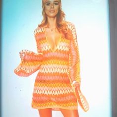 Awesome Sexy Insane Shift Dress. Sheer Orange Material With A Chevron Print, Plunge Neckline, Flare Sleeve And Loose Fit New With Tag. Color: Orange Size: 6 Stretch V-neck Mini Dress For Vacation, Fitted V-neck Mini Dress For Beach Cover-up, Long Sleeve Stretch Summer Mini Dress, Long Sleeve Mini Dress For Spring Beachwear, Long Sleeve Stretch Mini Dress For Beachwear, Stretch V-neck Dress For Beach Season, Spring Beachwear Mini Dress With Long Sleeves, Beachwear Stretch Mini Dress With Long Sleeves, Stretch Long Sleeve Mini Dress For Beachwear