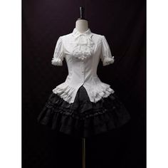 An item that will make you look like a mysterious and elegant young lady. It is richly decorated with lace embroidery and frills, and when paired with a bold chest ornament, it further enhances the gorgeous atmosphere. Like an aristocratic lady from medieval Europe. 
 
 

 

 
 
 
 Item 
 
 Blouse (black) + Jabot (black) 
 Blouse (purple) + jabot (purple) 
 Blouse (white) + Jabot (white) 
 Blouse (white) + Jabot (black) 
 Brooch (black x blue) 
 Brooch ( Black x Red) 
 Brooch ( Black x Purple) White Fitted Top For Costume Party, Elegant White Party Blouse, Elegant Cotton Party Blouse, Classic White Cotton Victorian Dress, Elegant Cotton Blouse For Party, Elegant White Ruffled Tops, Fitted White Victorian Blouse, White Fitted Victorian Blouse, White Fitted Blouse With Ruffled Collar