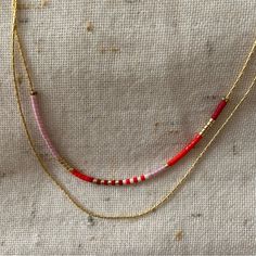 Nwt Gold Beaded And Chain Layered Necklace. White, Bright And Deep Red, Pink And Gold Beads. Lobster Claw Clasp. Perfect Condition, Never Worn. Teardrop Bead Necklace, Layered Seed Bead Necklace, Beaded Necklace Boho, Red Double Strand Beaded Necklaces, Pink Beaded Necklace With Tiny Beads For Gift, Pink Double Strand Beaded Necklaces As Gift, Pink Necklaces With Delicate Adjustable Chain, Pink Double Strand Beaded Necklace As Gift, Adjustable Pink Necklace With Delicate Chain