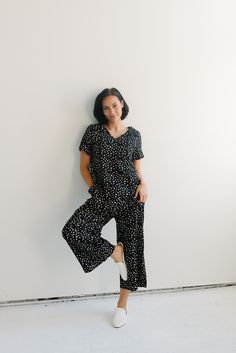 Perfect for so many occasions, the jasmine jumpsuit features short sleeves, an invisible zipper down the front, hidden pockets and a wide fit- it's designed for both comfort and style! It's ideal for pregnant or nursing mamas and absolutely long enough in length for those with long torsos. Pair this with mules, a hat, and our sweet pack for an easy, but elevated outfit. ALL PHOTOGRAPHS ARE TAKEN IN NATURAL LIGHT WHICH IS WHY THE COLORS MAY VARY BETWEEN PICTURES, SCREENS + IN-PERSON. THEY APPEAR Spring Loungewear Jumpsuits And Rompers With Short Sleeves, Spring Short Sleeve Jumpsuits And Rompers For Loungewear, Long Torso, Water Resistant Fabric, Everyday Essentials, Invisible Zipper, Everyday Essentials Products, Nursing, Jumpsuit