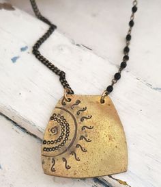 Brass sun artisan brass necklace Chic Handmade Festival Jewelry, Bohemian Metal Necklaces For Everyday, Bohemian Metal Necklace For Everyday, Bohemian Metal Necklace For Everyday Wear, Bohemian Metal Necklaces For Everyday Wear, Chic Handmade Necklaces, Chic Handmade Beach Necklaces, Vintage Pendant Necklace For Beach, Unique Everyday Brass Necklace