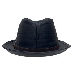 Looking for a stylish and unique leather fedora hat? Look no further than the Balboa! This hat is made from high quality leather and features a brim 1 3/4" wide and a crown 3 3/4" tall. The unique brown band adds a touch of style, while the black and brown colors make it versatile for any outfit. Leather Brim 1 3/4" Crown 3 3/4" Featherweight Sizing Info Brim 1 3/4" Crown 3 3/4" For detailed sizing info, click here to watch a short, informative video. We offer FREE EXCHANGES/RETURNS in case you