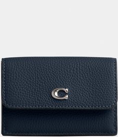 From COACH, the Essential Mini Trifold Wallet features:Mini Trifold Wallet Polished pebble leatherSix credit card slotsFull-length bill compartmentSnap closureOutside snapCoin pocket approx.4.25'' Approx.(L) x 2.75 (H) x 1 (W)Imported. Cute Wallets For Women, Polished Pebble, Trifold Wallet, Dillard's, Global Fashion, Dark Navy, Things To Buy, Pebbled Leather