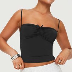 Step into summer with a splash of Y2K nostalgia in our Ruched Spaghetti Strap Camisole. This stylish piece combines vintage flair with modern fashion, making it a must-have for your warm-weather wardrobe. Whether you're catching up with friends at a café or dancing the night away at a beach party, this top will keep you looking chic and feeling comfortable. Key Features Elasticity: Medium stretch for a flattering fit that moves with you Fabric: High-quality broadcloth that's both durable and bre Y2k Nostalgia, Backless Crop Top, Summer Crop Tops, Backless Design, Design Set, Contemporary Fashion, Style Classic, Modern Fashion, Beach Party