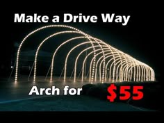 an arch is lit up with christmas lights and the words, make a drive way