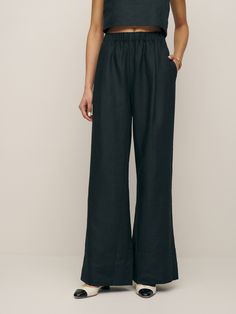 Be a little flexible. The Petite Fernando is a mid rise pant with an elastic waistband and relaxed wide leg. Wide Leg Pants For Elevated Casual Wear, Relaxed Fit Wide Leg Pants With Pull-on Style, Elevated Casual Bottoms With Relaxed Fit, Relaxed Fit Bottoms For Elevated Casual Wear, Elevated Casual Relaxed Fit Pull-on Bottoms, Elevated Casual Elastic Waistband Bottoms For Fall, Elevated Casual Bottoms With Elastic Waistband For Fall, Elevated Casual Fall Bottoms With Elastic Waistband, Chic Linen Wide Leg Pants With Pull-on Style