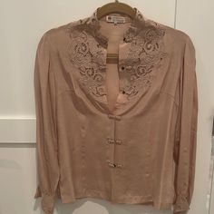 100% Silk Silk V-neck Top With Embroidery, Elegant V-neck Blouse With Floral Embroidery, Embroidered Long Sleeve Tops For Formal Occasions, Embroidered Long Sleeve Formal Tops, Elegant Long Sleeve Embroidered Blouse, Chic Silk Blouse With Floral Embroidery, Elegant Long Sleeve Embroidered Top With Floral Embroidery, Elegant Embroidered Tops For Evening, Elegant Embroidered Evening Tops