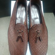 Woven Leather Loafers Italian Leather Tassel Slip-on Loafers, Elegant Slip-on Moccasins With Woven Sole, Italian Leather Slip-on Tassel Loafers, Luxury Brown Slip-on Tassel Loafers, Elegant Leather Boat Shoes With Textured Sole, Leather Loafers With Woven Sole And Almond Toe, Elegant Brown Tassel Loafers With Flat Heel, Designer Tassel Loafers With Leather Sole For Galas, Elegant Slip-on Boat Shoes With Textured Sole