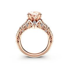 a rose gold engagement ring with an intricate design