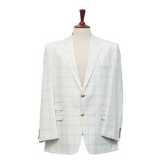 This Chiragh Apparel blazer is an elegant upgrade on dapper tailoring and features rich shades in a sumptuous fabric for elegant opulence. Fashioned from premium quality wool, this plaid check blazer features full lining in Japanese silk, a notch lapel, two-button closure and single-vented back. A left chest pocket and three flap pockets appoint the front while the inside has two (2) pockets on the left and one (1) pocket on the right. A flash of contrast piping is added to the jacket lining ins White Single Breasted Sport Coat, White Single-breasted Sport Coat For Office, White Fitted Single Breasted Sport Coat, Semi-formal White Sport Coat With Single Button, Luxury White Single-breasted Sport Coat, Elegant Blazers, Japanese Silk, Checked Blazer, White Blazer