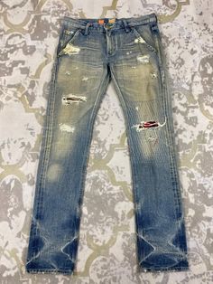 Distressed Blue Vintage Lee Jeans 33x33 Denim- JN3660 Size: 33 Actual measurement (inches): Waist - 33 Front Rise - 8.5 Hips - 40 Thigh - 11 Knee - 7.5 Leg Opening - 14 Inseam - 33 Outseam - 42 Material : Cotton    #JN3660 Distressed Medium Wash Rigid Denim Jeans, Ripped Jeans In Recycled Denim, Fitted Distressed Denim Blue Jeans, Rugged Distressed Straight Leg Jeans, Ripped Fitted Jeans In Recycled Denim, Rugged Recycled Denim Blue Jeans, Rugged Recycled Denim Jeans In Denim Blue, Rugged Recycled Denim Jeans In Blue, Faded Ripped Denim Jeans