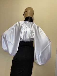 "This is a very stylish Womens Satin blouse. It is comfortable and cozy. Made for a free flowing fit. Black high collar and cuffs. Satin covered buttons Great for all year around and for any special occasion or casual day can be dressed up or dressed down. SIZE CHART SIZE S - US 6, UK 8, EU 36 bust: bust around 34.5\"/90cm Waist: waist around 27.5\"/70cm Hips: hips around 34.5\"/90cm SIZE M - US 8, UK 10, EU 38 bust: bust around 37.5\"/95cm Waist: waist around 29.5\"/75cm Hips: hips around 37.5\ Elegant Collared Blouse For Parties, Formal Blouse With Collar And Cuffed Sleeves, Formal Collared Padded Blouse, Formal Collared Blouse With Blouson Sleeves, Formal Padded Collared Blouse, Silk Party Top With Collar, Silk Evening Blouse With Collar, Collared Padded Blouse For Formal Occasions, Padded Collared Blouse For Formal Occasions