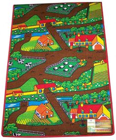 a brown area rug with farm scenes and houses on the ground, in front of a white background