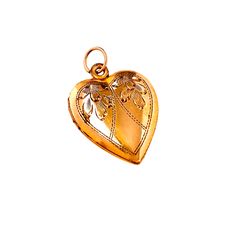 "Vintage 1940s 12K gold filled heart locket with etched floral hand engraved. This lovely statement pendant is engraved with a unique leafy flower design. The locket opens with ease and closes with a strong snap. It has a beautiful etched design on front. This would make a fantastic addition to any jewelry collection. A beautiful piece of keepsake jewelry. Marked 1/20 12K GF Locket measures 1\" X 3/4\" from the top of its original bale. A condition is excellent, with no damages or repairs. Heart Deco Photo, Gold Jewellery Collection, Tattoo Zeichnungen, Engraving Art, Valentine Day Gift, Large Heart, Keepsake Jewelry, Photo Locket, Photo Heart