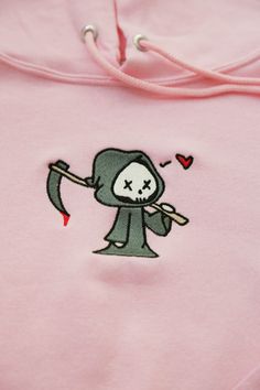 ✰Embroidered✰UNISEX✰Hand drawn and designed✰50% cotton, 50% polyester✰Super soft and comfy!✰Model is 5'5 and wearing Size L in an Pink Hoodie Grim Reaper Embroidery, Cute Hoodie With Embroidered Graphics For Streetwear, Halloween Hoodies For Women, Cute Hooded Sweatshirt With Custom Embroidery, Cute Hooded Sweatshirt With Embroidered Graphics, Cute Embroidered Hoodie For Streetwear, Cute Hoodie With Custom Embroidery For Winter, Cute Hooded Tops With Embroidered Logo, Cute Hooded Top With Embroidered Logo