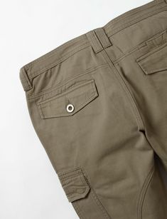 Twill pant with dual cargo pockets with flaps, direct Pigeon embroidery on left cargo pocket, front slant pockets, back welt pockets with flaps, reinforced seat, zip fly, and adjustable drawstring ankle closures. 100% Cotton. Imported. By Staple Pigeon.Style: 2209B7073 Khaki Outdoor Bottoms With Hip Pockets, Khaki Bottoms With Hip Pockets For Outdoor, Military Cargo Shorts For Outdoor, Outdoor Khaki Cargo Pants With Side Pockets, Khaki Bottoms With Patch Pockets For Outdoor, Khaki Bottoms With Patch Pockets For Outdoor Activities, Khaki Cargo Pants With Pockets For Outdoor, Outdoor Bottoms With Side Pockets And Tapered Leg, Utility Style Outdoor Pants With Cargo Pockets