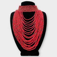 Enhance your jewellery collection with this authentic African red Beaded Choker Necklace. The necklace features beautiful beads in a vibrant orange colour that will add a pop of colour to any outfit. The choker style is perfect for women and the beaded design adds a touch of elegance to the piece.  Material: Beads Size: One Size Height Length: 28cm Colour: Red Weight:140g Red Round Beads Jewelry For Festive Occasions, Festive Red Beaded Jewelry, Red Beaded Necklaces For Festivals And Gifts, Red Beads For Festive Gift, Festive Red Handmade Beaded Necklaces, Traditional Party Beaded Necklaces With Large Beads, Traditional Beaded Necklace With Large Beads For Party, Festive Red Beaded Necklaces With Polished Beads, Orange Red Coral Beaded Necklaces With Large Beads