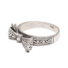 Named for the city of Celuk, the silver and gold center of Bali, this cocktail ring by Dewa Arimbawa perfectly illustrates its namesake, with expertly crafted silversmithing and artistry. Crowned with an ornate bow, this ring features intricate details and a leafy vine motif. Sterling silver Combination finish Handmade in & fairly traded from Indonesia Paw Print Jewelry, Spirit Clothing, Fair Trade Clothing, Ribbon Jewelry, Silver Cocktail, Fair Trade Jewelry, Printed Jewelry, Flip Flop Shoes, Bike Accessories