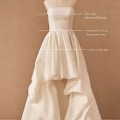 a white dress is shown with measurements for it