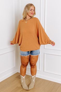 Keep your weekend style simple with this casual plus size pumpkin colored shift top featuring lightweight material with subtle horizontal accent stripes, a rounded neckline, long batwing sleeves, and a slouched silhouette that falls into a straight hemline! Measurements 1XL : Bust 40", Hip 40", Length 27", Sleeve Length 24", Waist 40". 2XL : Bust 42", Hip 42", Length 27", Sleeve Length 25", Waist 42". 3XL : Bust 44", Hip 44", Length 27", Sleeve Length 25", Waist 44". Oversized Ribbed Top With Batwing Sleeves, Oversized Ribbed Brown Top, Oversized Ribbed Batwing Sleeve Top, Summer Wedding Gowns, Luna Fashion, Skirt Outfits Summer, Indie Dresses, Casual Summer Outfits For Women, Shein Outfits