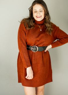 A soft, cozy, and very warm knit sweater dress, perfect for walks in early autumn. I love pairing this with our Newt Coat, or the Evermore shacket, for a full look! Dress is thickly knit, with a roll turtleneck, and loose boxy shape. It comes in a rust color, or nice, warm beigey camel. I've cinched it here with a belt, but wear it without if you want it extra comfy! Model is wearing a small Small: length - 31”, width - 24” Medium: length - 32”, width - 25” Large: length - 33”, width - 26” Remin Casual Turtleneck Sweater Dress For Work, Cozy Brown Sweater Dress For Winter, Cozy Brown Winter Sweater Dress, Chunky Knit Sweater Dress For Fall, High Neck Sweater Dress For Fall Workwear, Cozy Fall Sweater Dress For Layering, Cozy Sweater Dress For Fall Layering, Chic Turtleneck Sweater Dress For Fall, Turtleneck Knit Sweater Dress For Fall