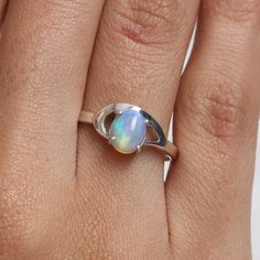 "Ethiopian Opal Ring, 925 Sterling Silver Ring, Oval Gemstone Ring, Women Silver Jewelry, Handmade Ring, Bohemian Ring, Birthday Gift for Her Gemstone Name - Ethiopian Opal  Stone Quality - AAA  Weight - 2.13 gm Stone Shape - As shown in the picture Ring Size - All Ring Size Available  We serve complete 925 sterling silver Jewelry and genuine properties of the stone. The products are dispatched from the small business from UK.  Product Quality and Packaging - Our all products are 925 Silver Stam Unique Oval Opal Birthstone Ring, Fine Jewelry Sterling Silver Oval Opal Ring, Handmade Oval Sterling Silver Opal Ring, Handmade Oval Opal Ring In Sterling Silver, Spiritual Opal Birthstone Ring, Oval Opal Rings With Spiritual Style, Adjustable Oval Sterling Silver Crystal Ring, Adjustable Oval Cabochon Opal Ring, Adjustable Oval Crystal Ring In Sterling Silver