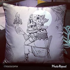 a pillow with a drawing of a skeleton on it