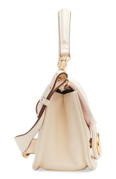 VLOGO hardware details the curved flap of an elongated shoulder bag crafted from lambskin leather in a softly structured silhouette. Magnetic-snap flap closure Removable top carry handle; removable, adjustable crossbody strap Interior wall pocket Lined Leather Made in Italy Designer Handbags White Leather Double Flap Shoulder Bag, Chic White Double Flap Shoulder Bag, Luxury Beige Shoulder Bag With Turn-lock Closure, White Leather Shoulder Bag With Cc Turnlock Closure, Modern Top Handle Shoulder Bag With Horsebit Detail, Modern Shoulder Bag With Horsebit Detail And Top Handle, Leather Satchel With Cc Turnlock Closure And Double Handle, Luxury Beige Flap Bag With Cc Turnlock Closure, Elegant Double Handle Satchel With Cc Turnlock Closure