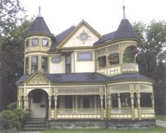 an old victorian style house in the country